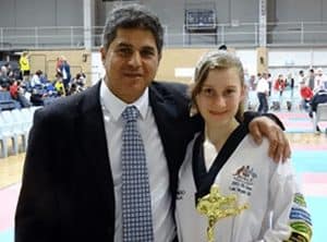 Laura Morison getting commendations from Grand Master Hassan Iskandar - Pinnacle Martial Arts